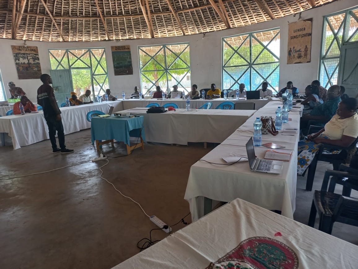 Ushahidi member training Tana River Community Members on use of the Ushahidi Platform
